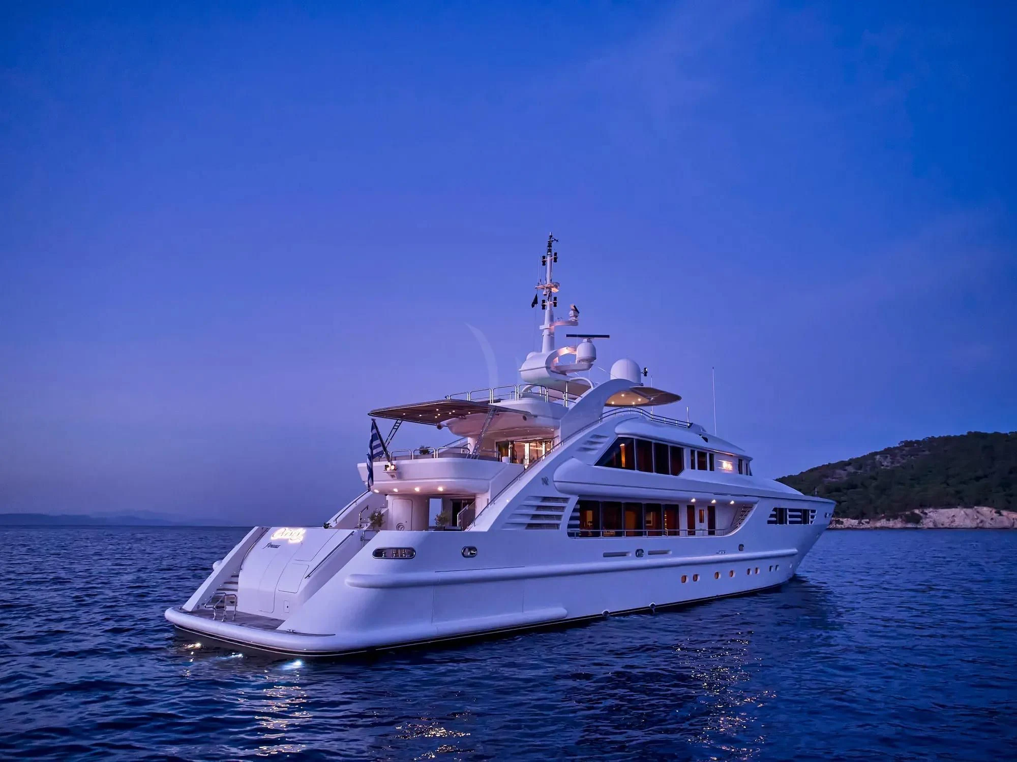 a white yacht in the water aboard OASIS Yacht for Sale