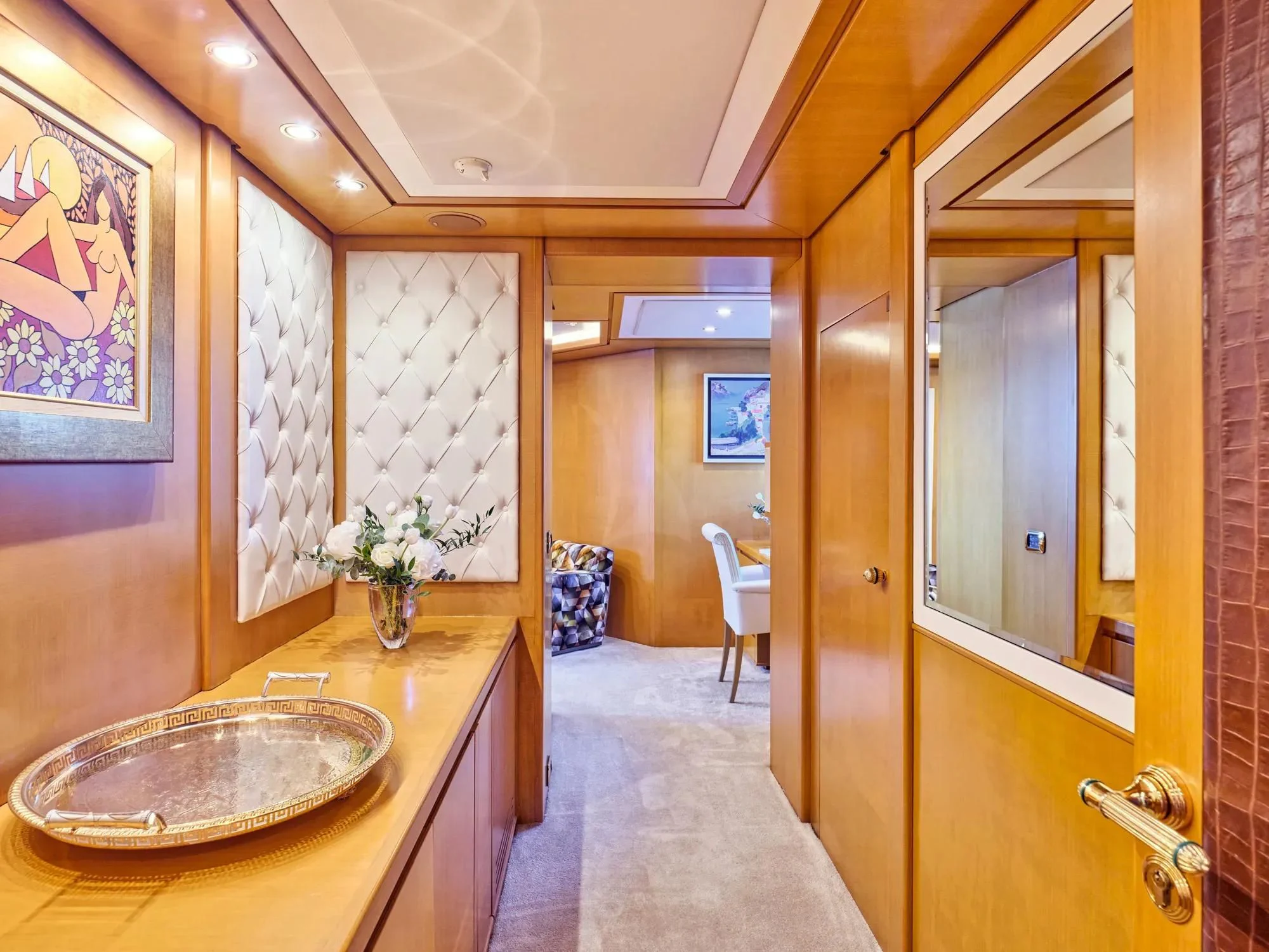 a bathroom with a sink and a mirror aboard OASIS Yacht for Sale