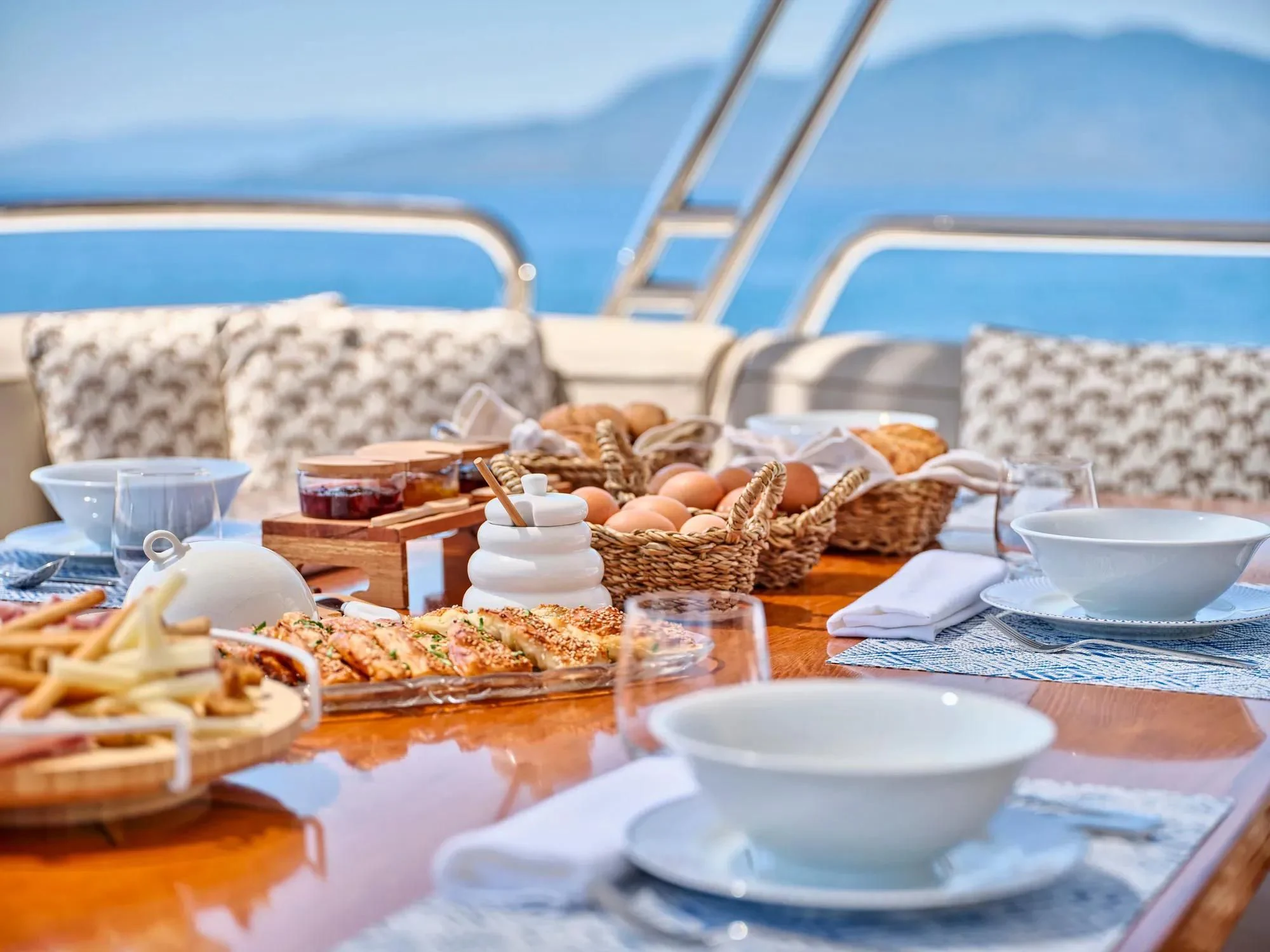 a table with food on it aboard OASIS Yacht for Sale