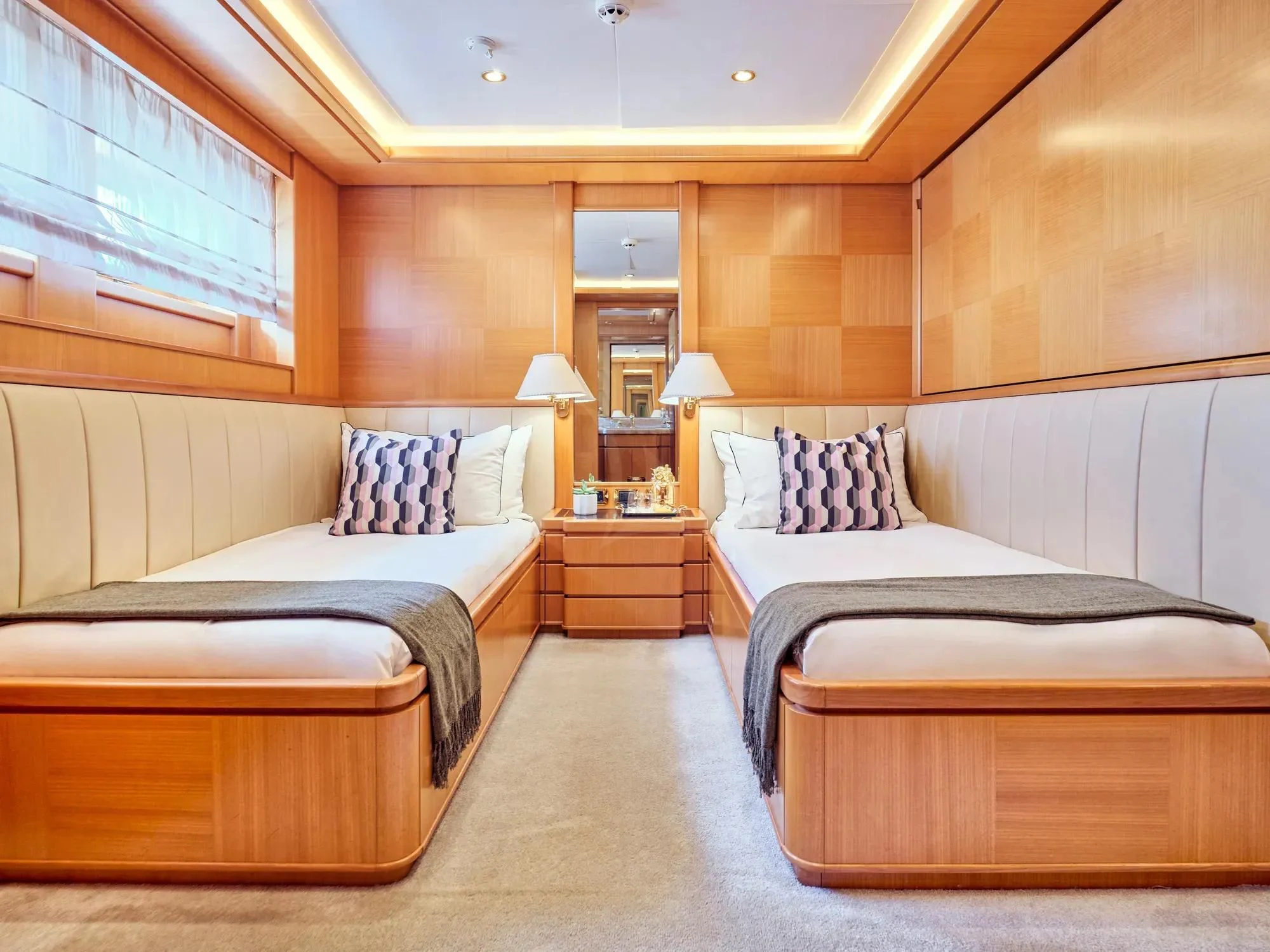 a room with two beds aboard OASIS Yacht for Sale