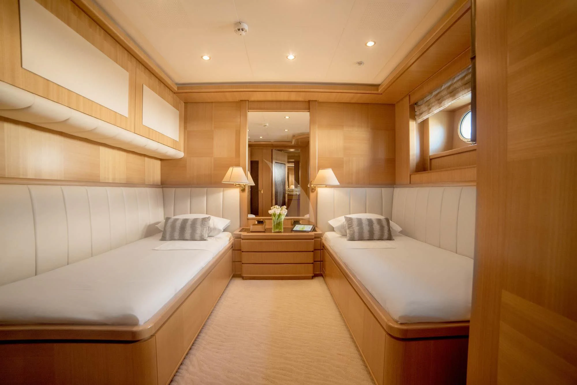 a room with two beds aboard OASIS Yacht for Sale