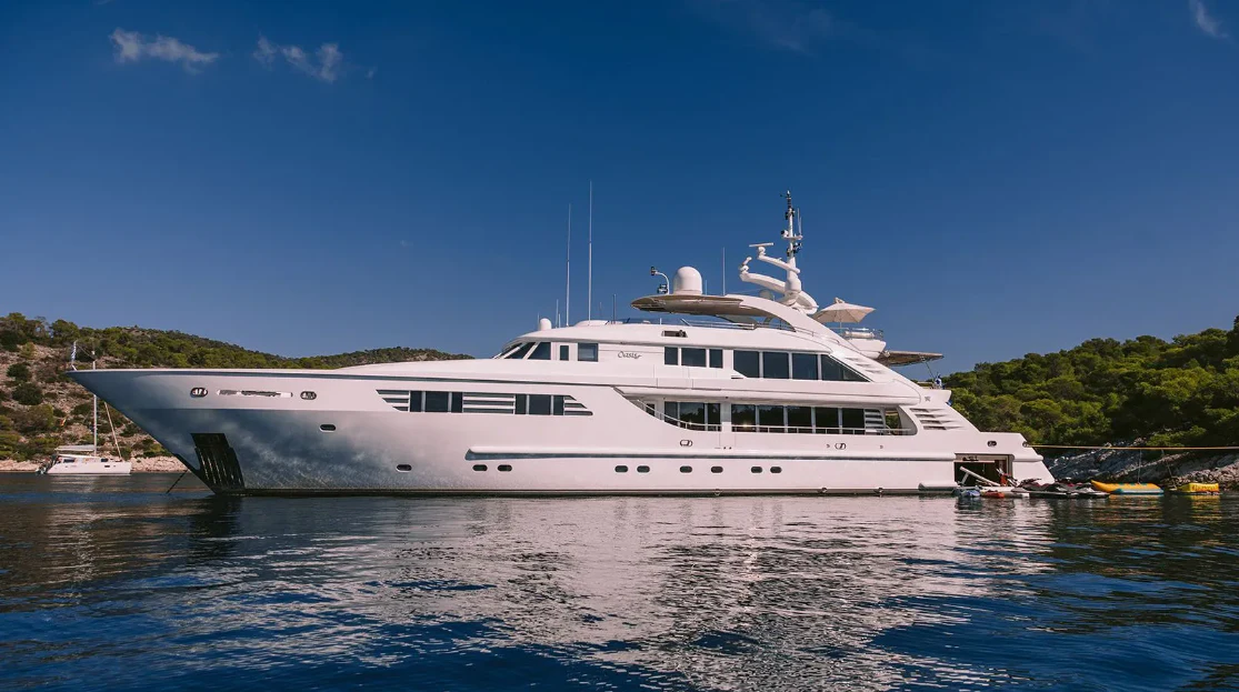 a white boat on water aboard OASIS Yacht for Sale