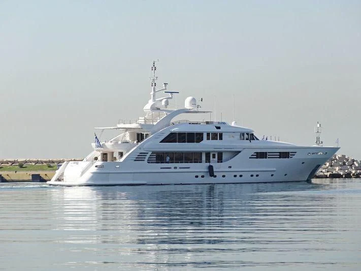 a white yacht on the water aboard OASIS Yacht for Sale