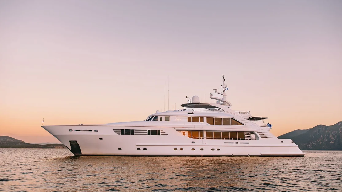 a large white boat in the water aboard OASIS Yacht for Sale