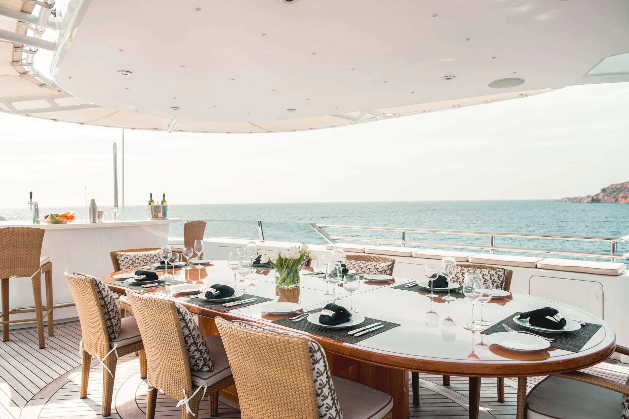 a table set for a meal aboard OASIS Yacht for Sale