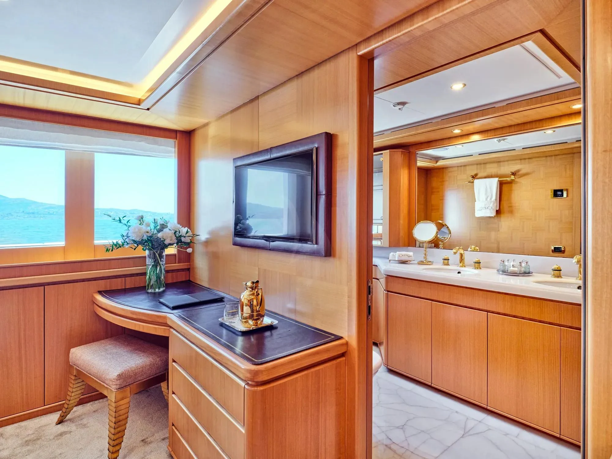 a bathroom with a sink and a mirror aboard OASIS Yacht for Sale