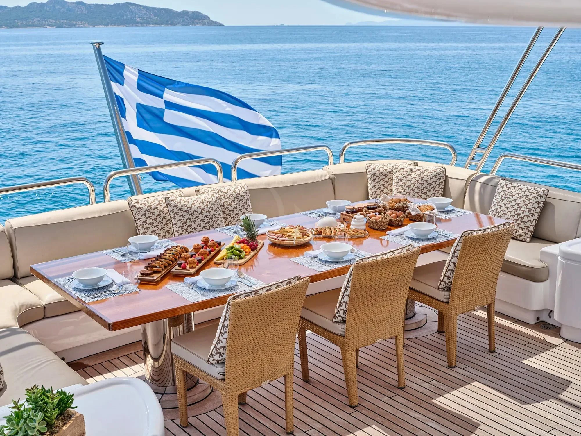 a table with food on it aboard OASIS Yacht for Sale
