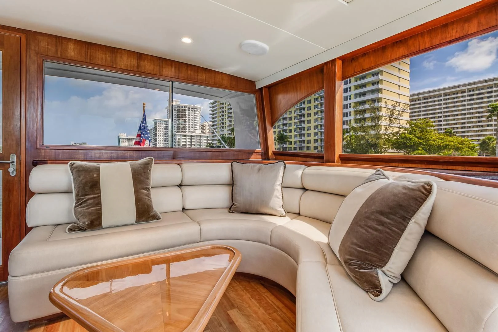 a couch with pillows and pillows aboard JEWEL OF THE NILE Yacht for Sale