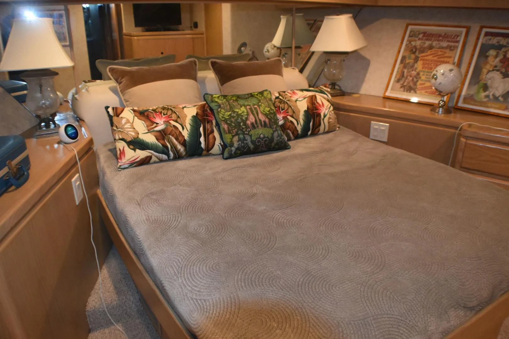 a bed with a pillow and a blanket on it aboard JEWEL OF THE NILE Yacht for Sale