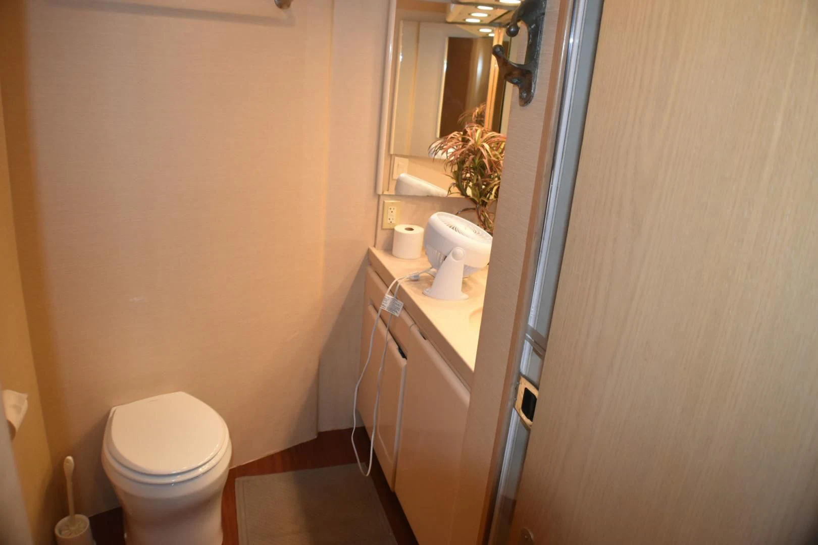 a bathroom with a toilet and sink aboard JEWEL OF THE NILE Yacht for Sale