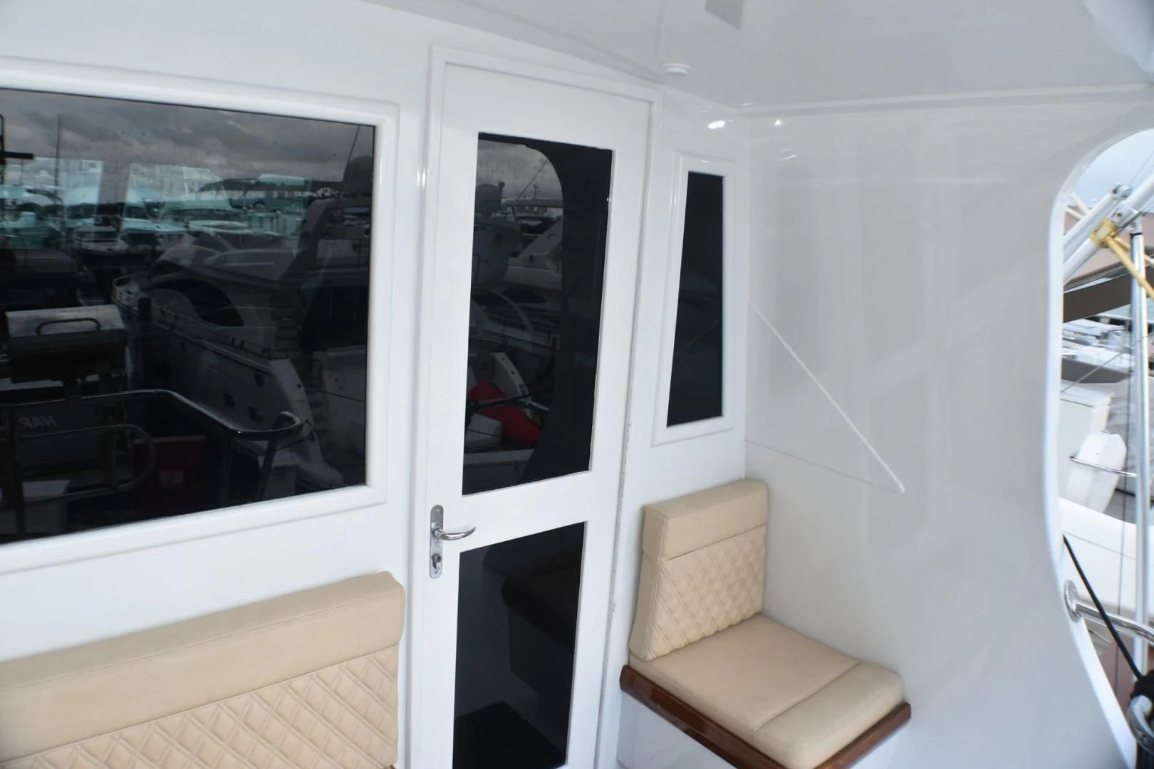 a white door with a window aboard JEWEL OF THE NILE Yacht for Sale