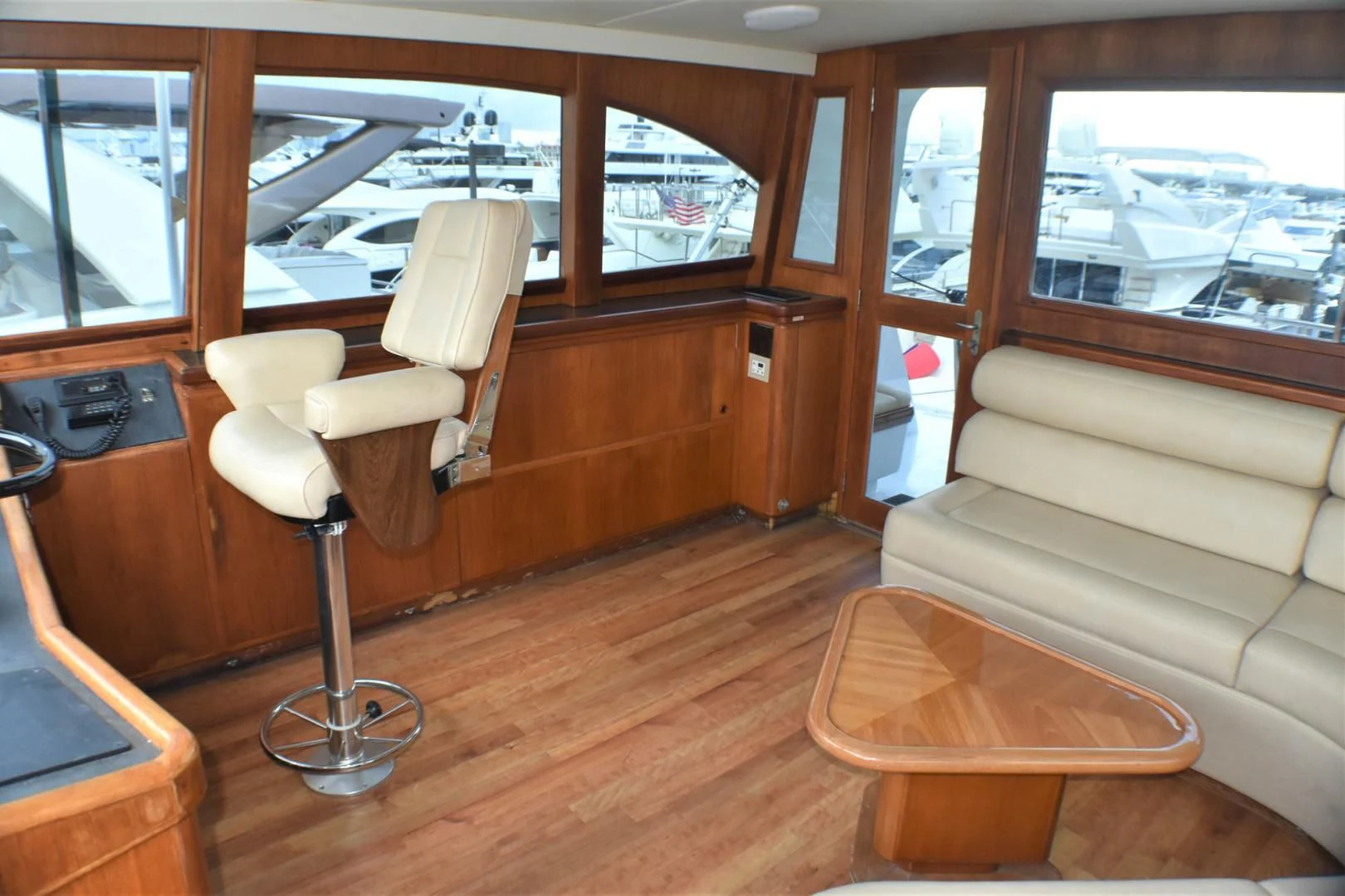 a room with a couch and a coffee table aboard JEWEL OF THE NILE Yacht for Sale