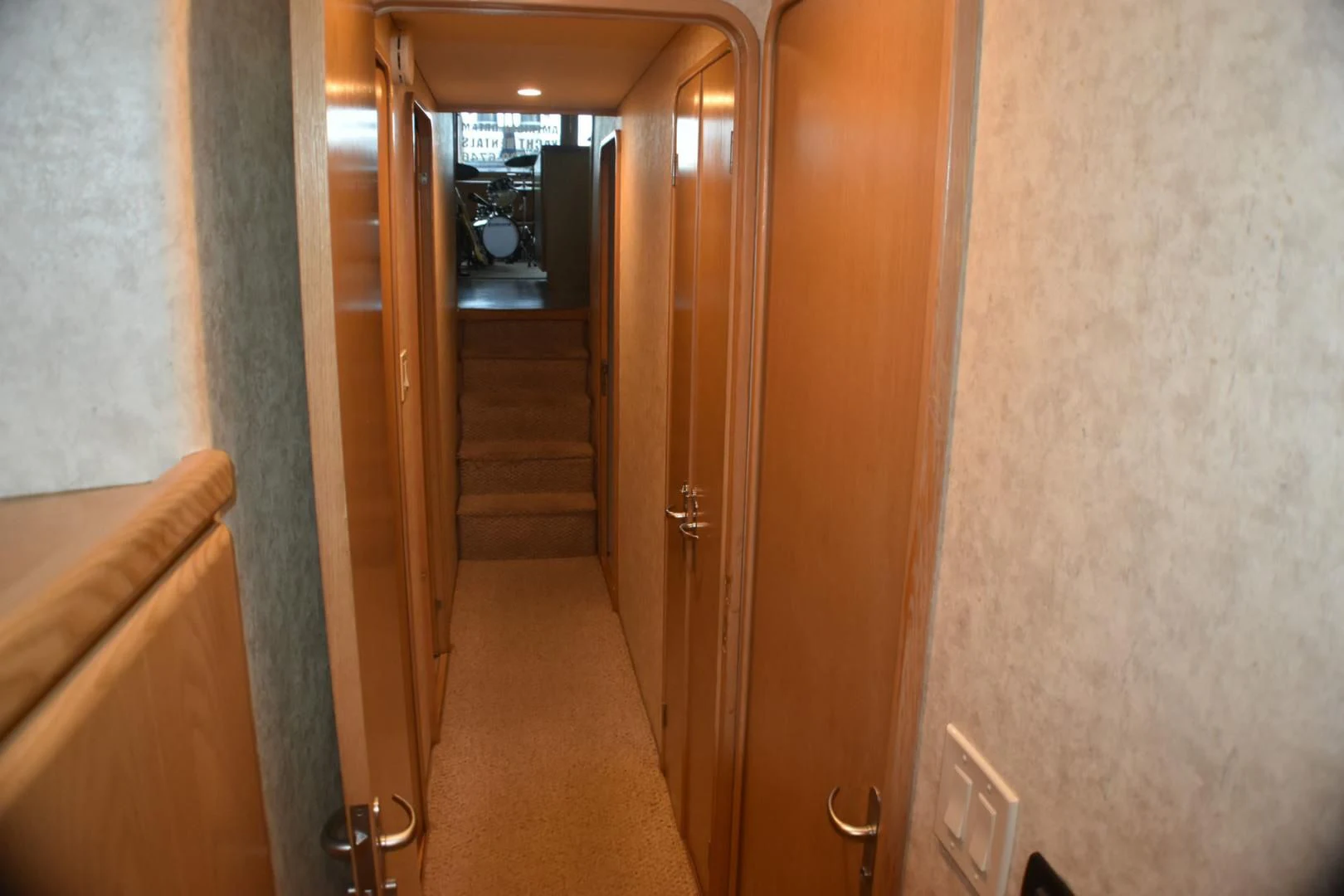 a hallway with doors aboard JEWEL OF THE NILE Yacht for Sale
