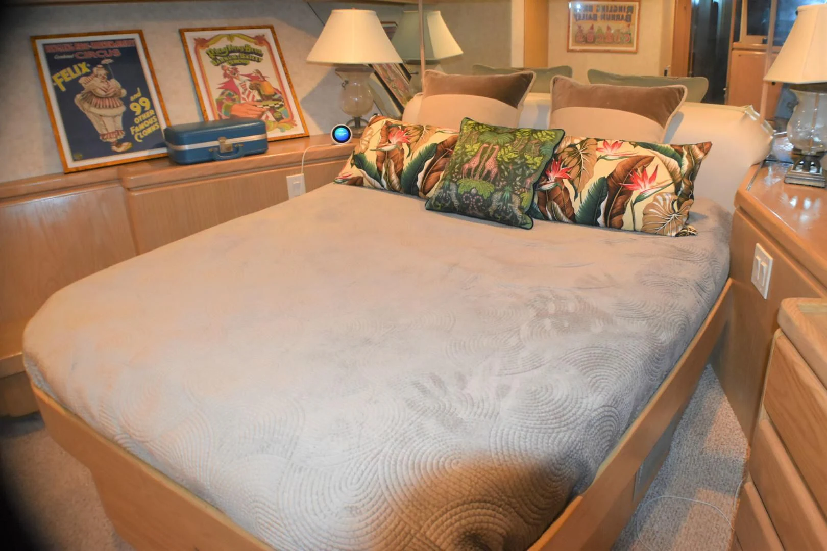 a bed with a white comforter aboard JEWEL OF THE NILE Yacht for Sale