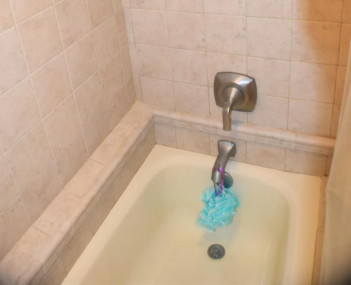 a bathtub with a faucet aboard JEWEL OF THE NILE Yacht for Sale