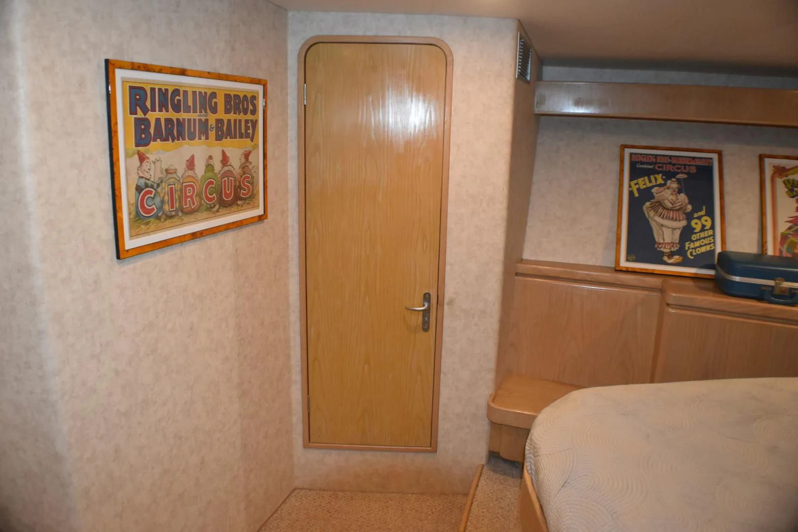 a room with a door and a couch aboard JEWEL OF THE NILE Yacht for Sale