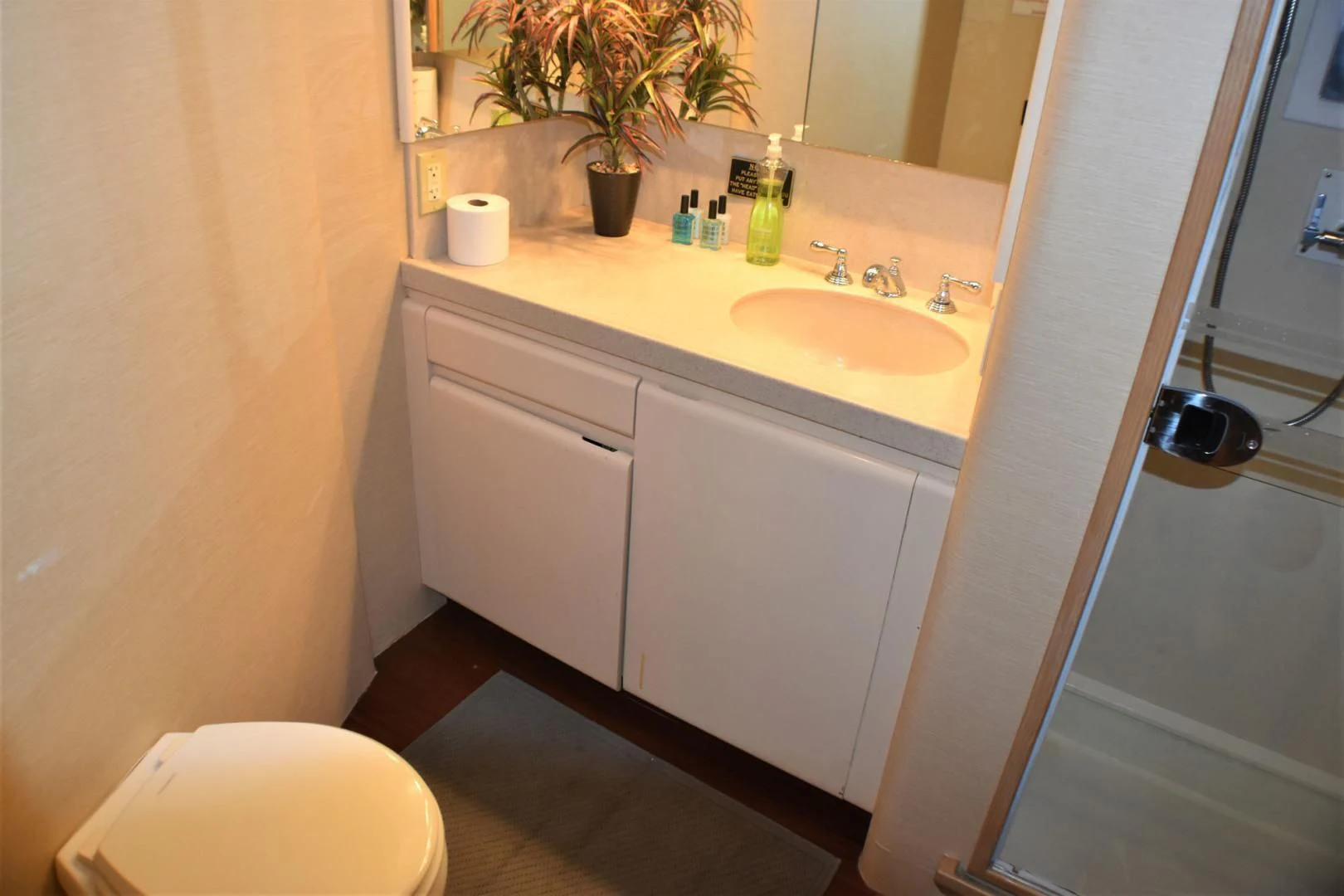 a bathroom with a sink and toilet aboard JEWEL OF THE NILE Yacht for Sale