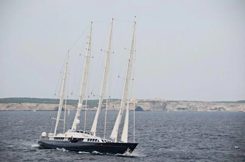 a sailboat on the water aboard ENIGMA Yacht for Sale