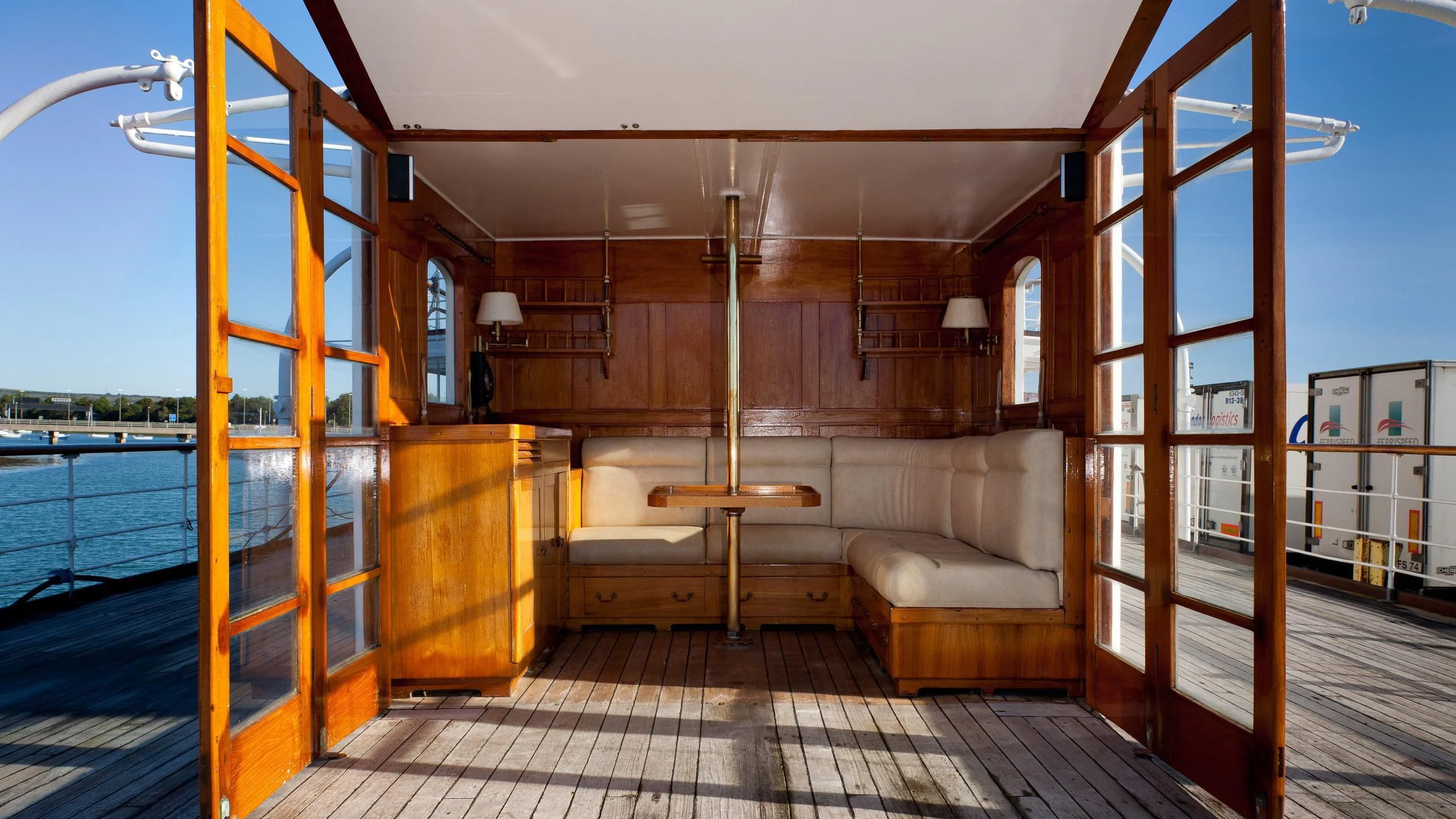 a room with a bed and a pool aboard SHEMARA Yacht for Sale