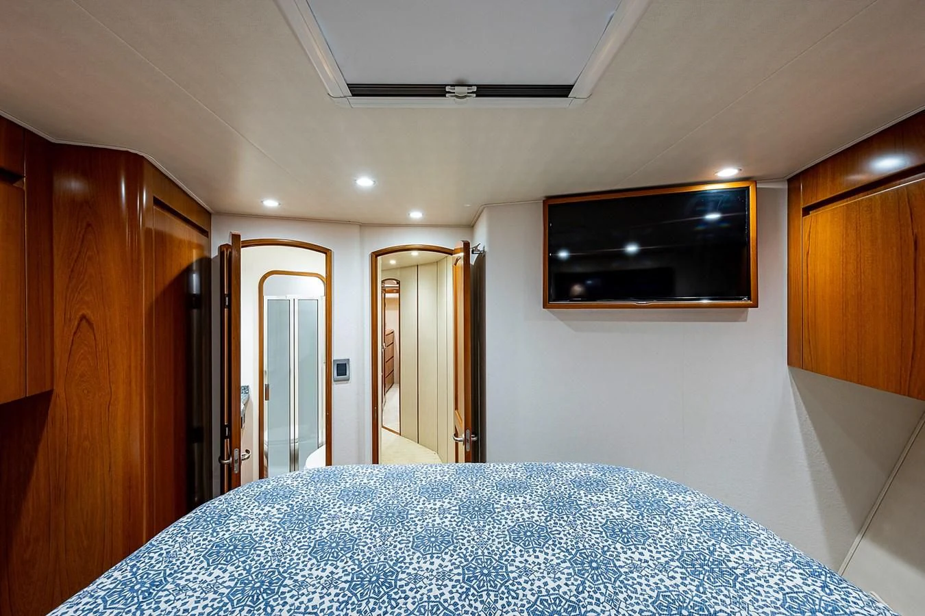 a bed in a room aboard LIFE IS GOOD Yacht for Sale