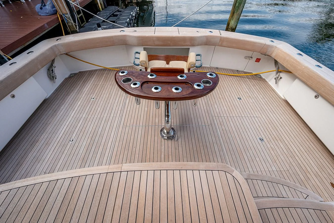 a wood boat on a deck aboard LIFE IS GOOD Yacht for Sale