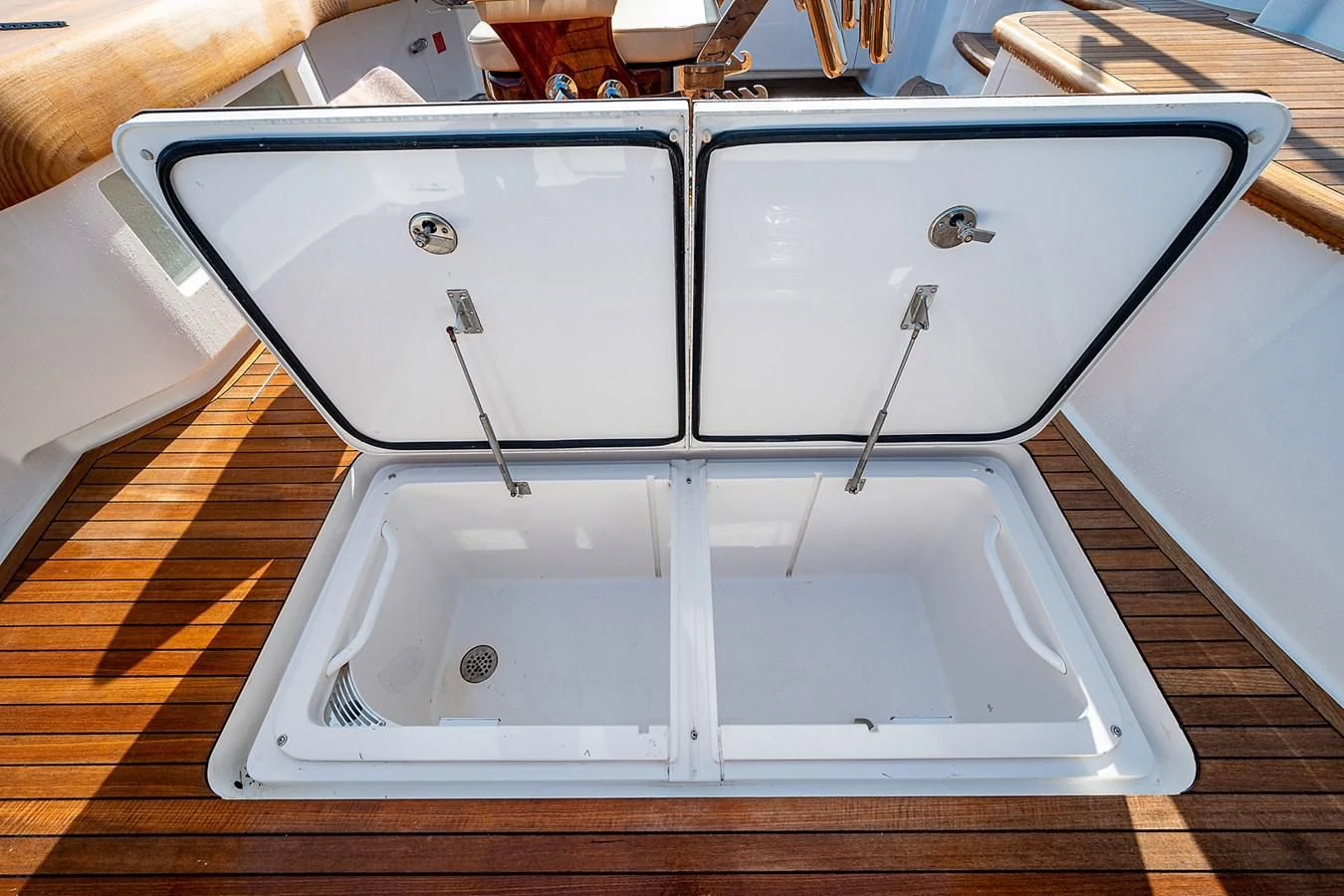 a group of white rectangular objects aboard LIFE IS GOOD Yacht for Sale