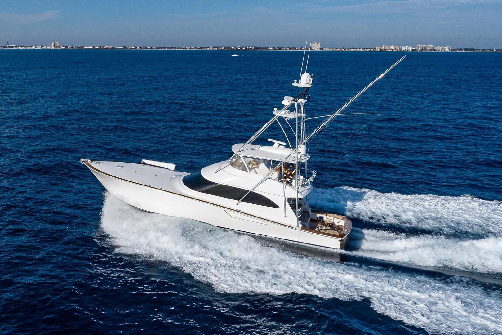 a white yacht in the water aboard LIFE IS GOOD Yacht for Sale