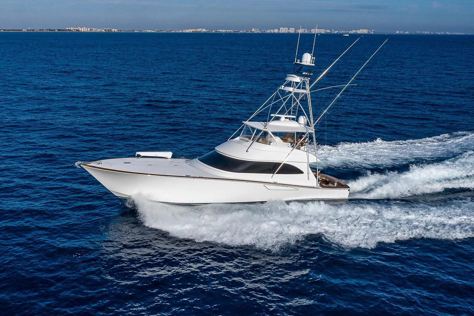 a white boat on the water aboard LIFE IS GOOD Yacht for Sale