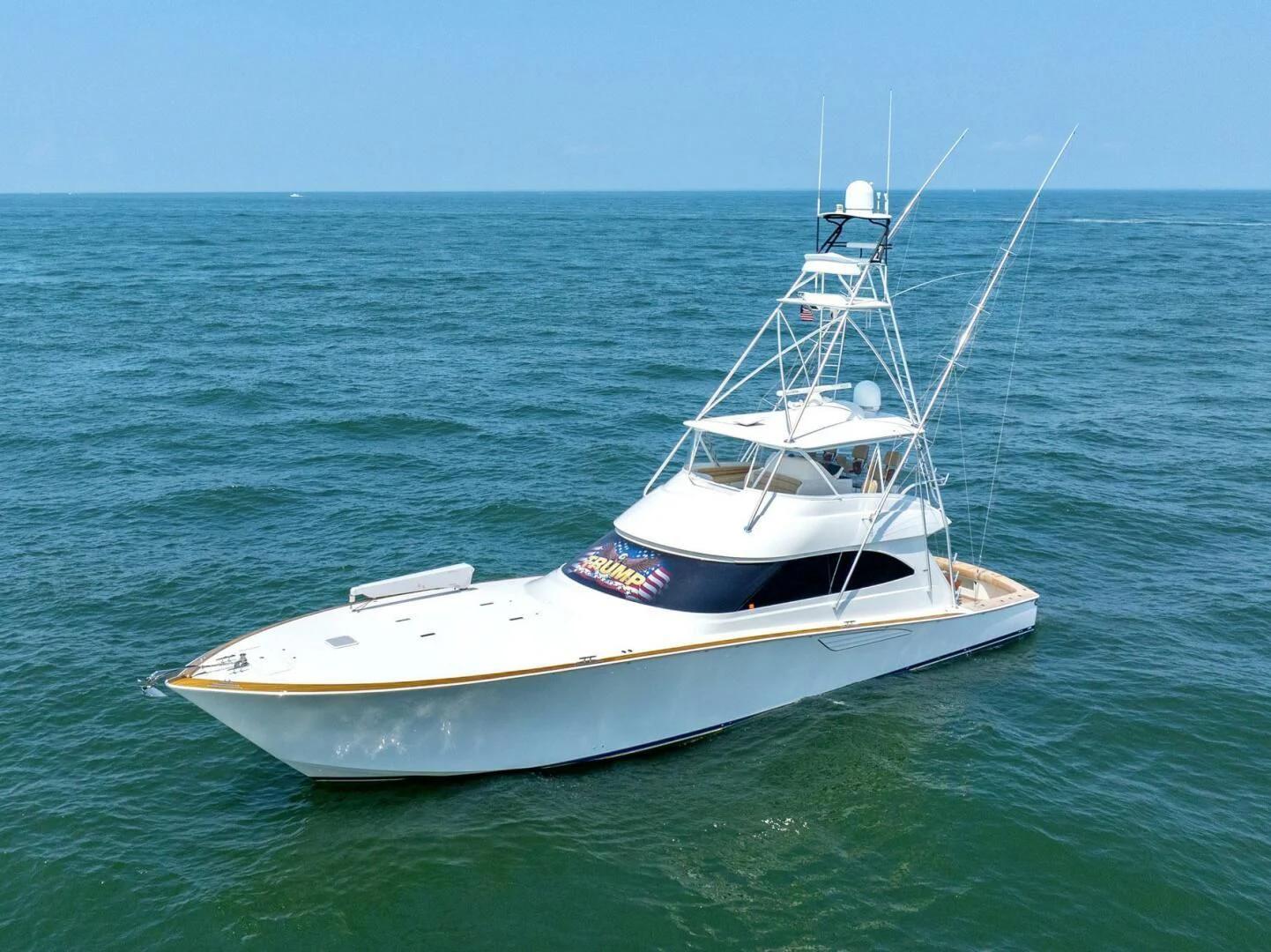 a white boat in the water aboard LIFE IS GOOD Yacht for Sale