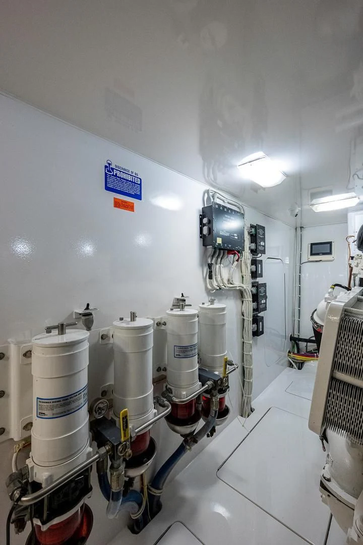 a room with several white pipes aboard LIFE IS GOOD Yacht for Sale
