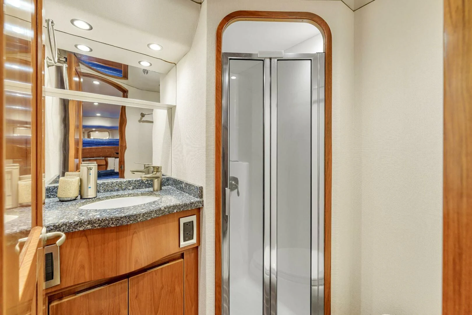 a bathroom with a large mirror aboard LIFE IS GOOD Yacht for Sale
