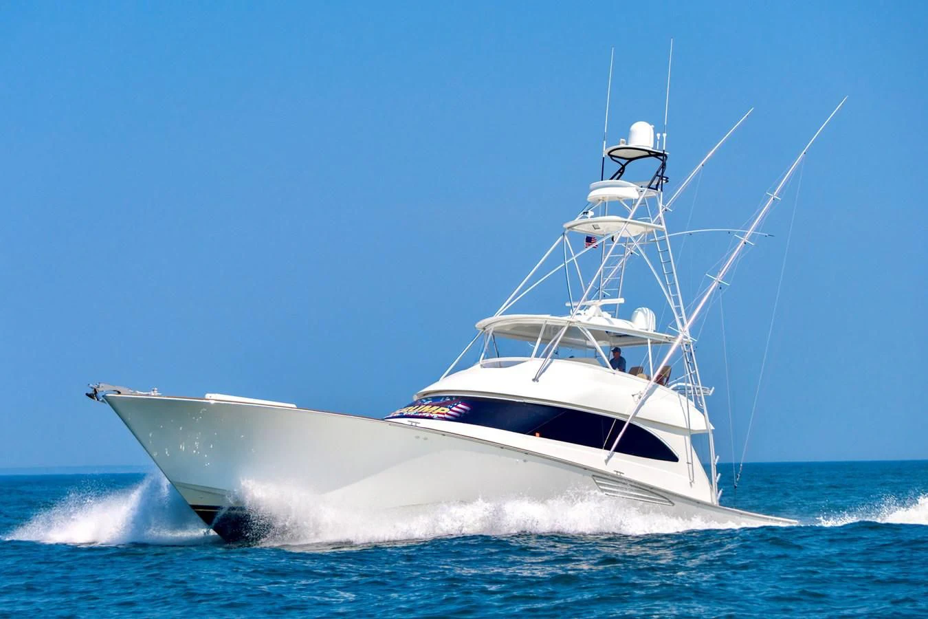 a white boat on the water aboard LIFE IS GOOD Yacht for Sale
