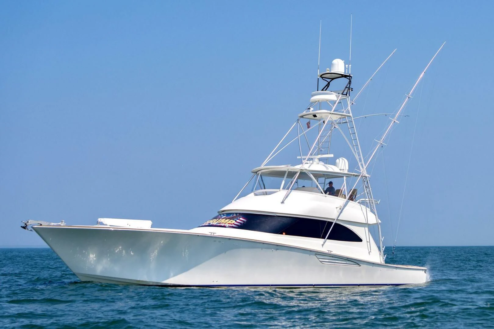 a white boat in the water aboard LIFE IS GOOD Yacht for Sale