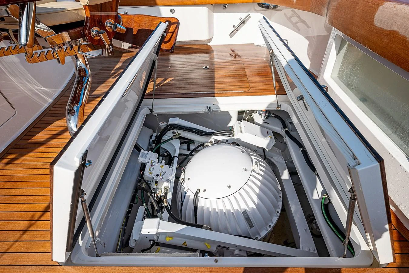 a large machine with a large round metal object on top aboard LIFE IS GOOD Yacht for Sale