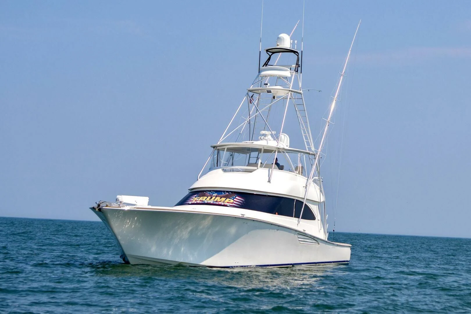 a white boat in the water aboard LIFE IS GOOD Yacht for Sale