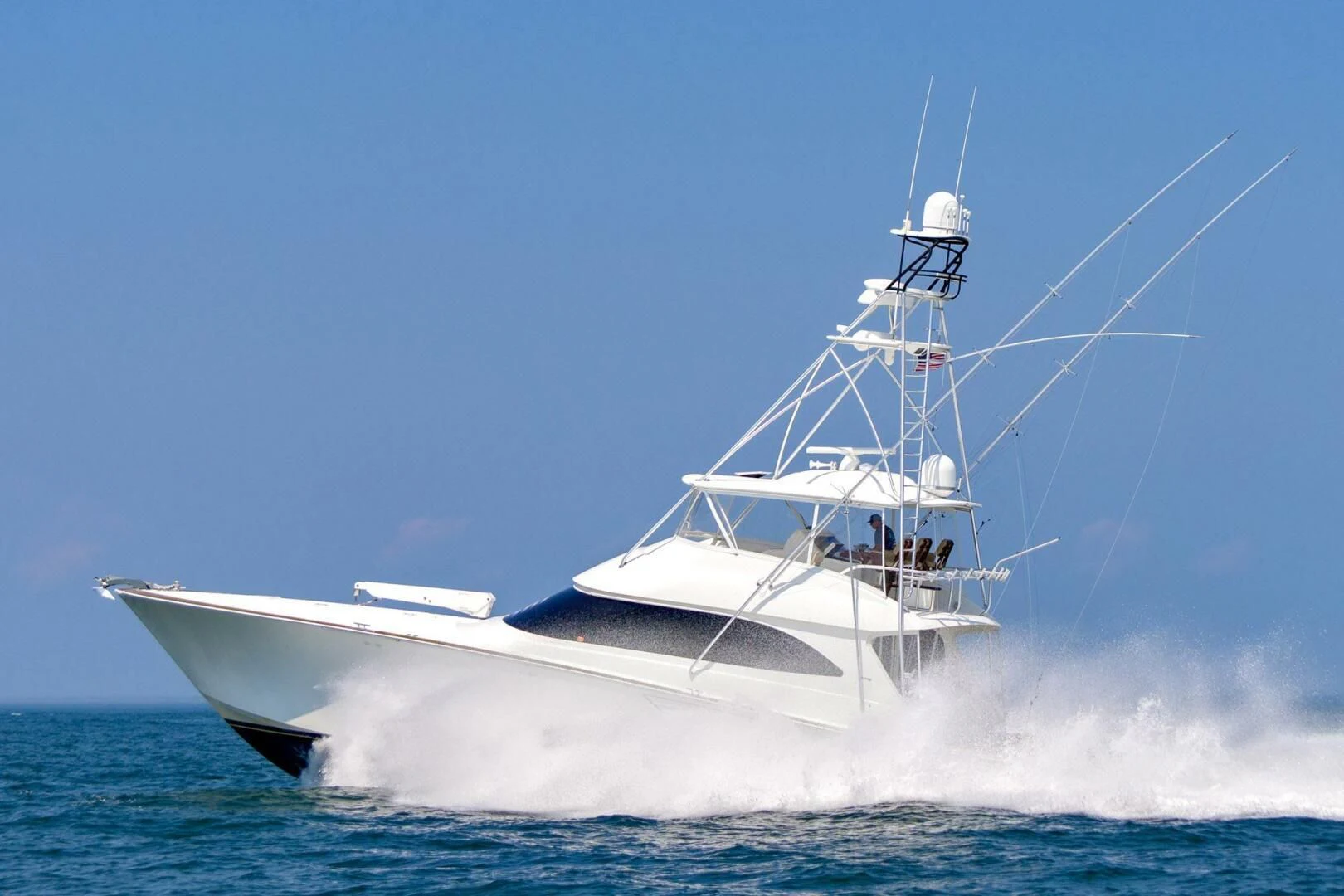 a white boat in the water aboard LIFE IS GOOD Yacht for Sale