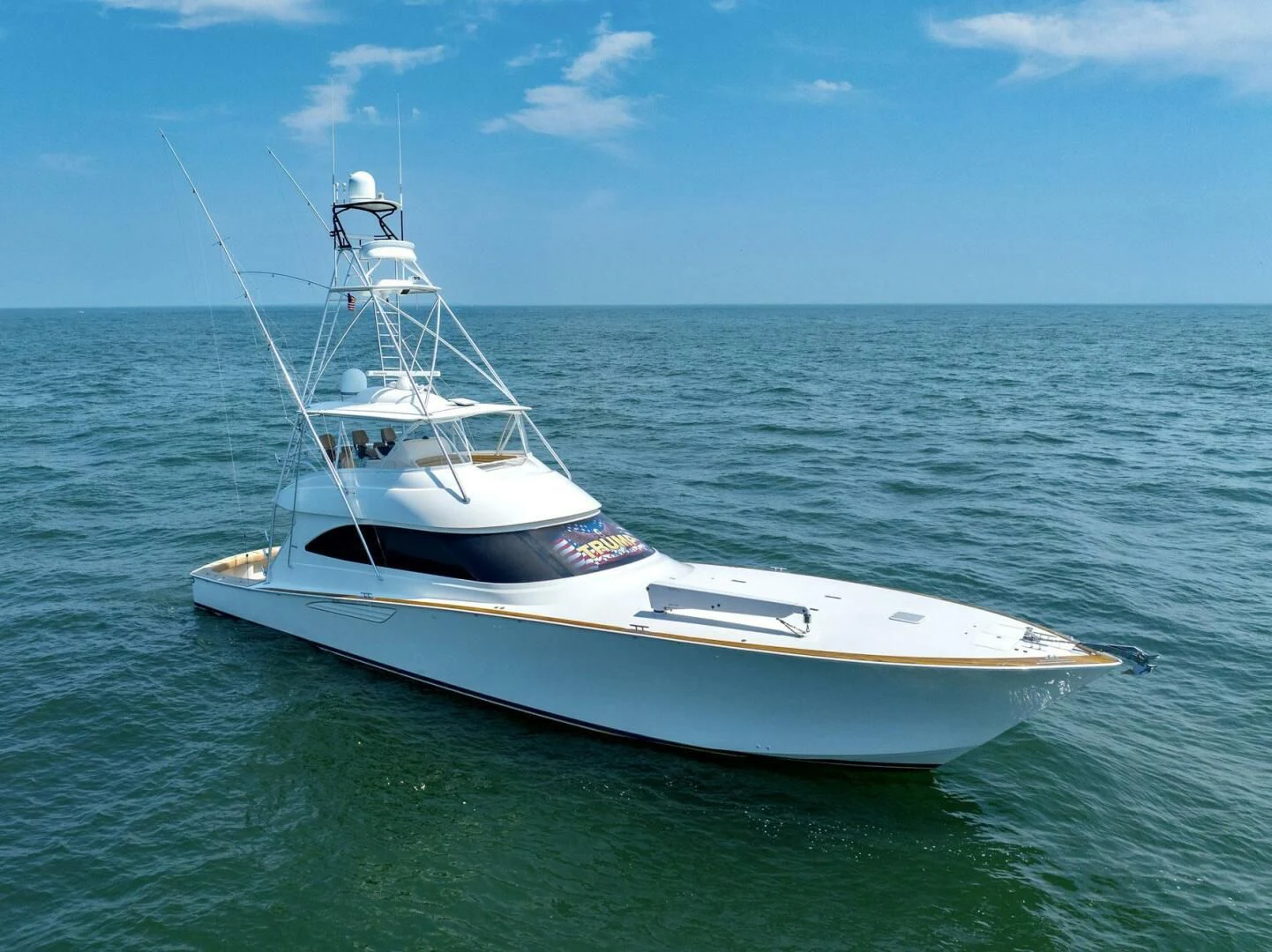 a white boat in the water aboard LIFE IS GOOD Yacht for Sale