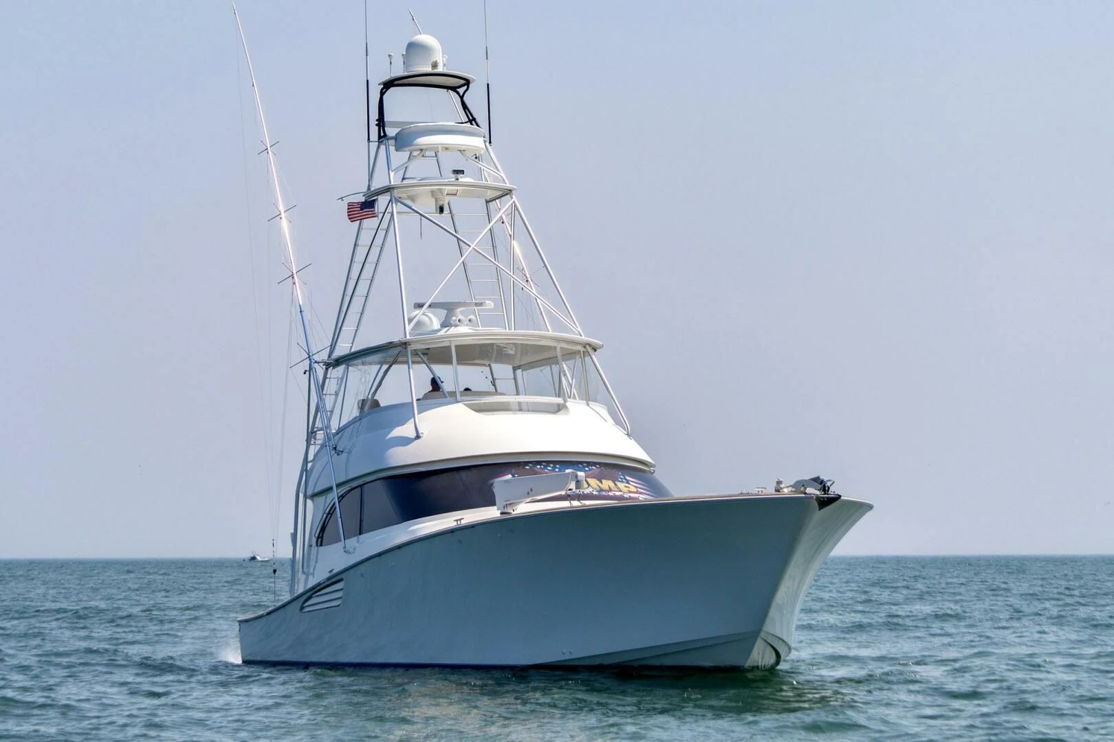 a large white boat in the water aboard LIFE IS GOOD Yacht for Sale