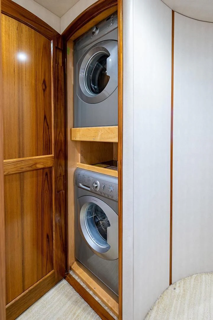 a washer and dryer in a room aboard LIFE IS GOOD Yacht for Sale