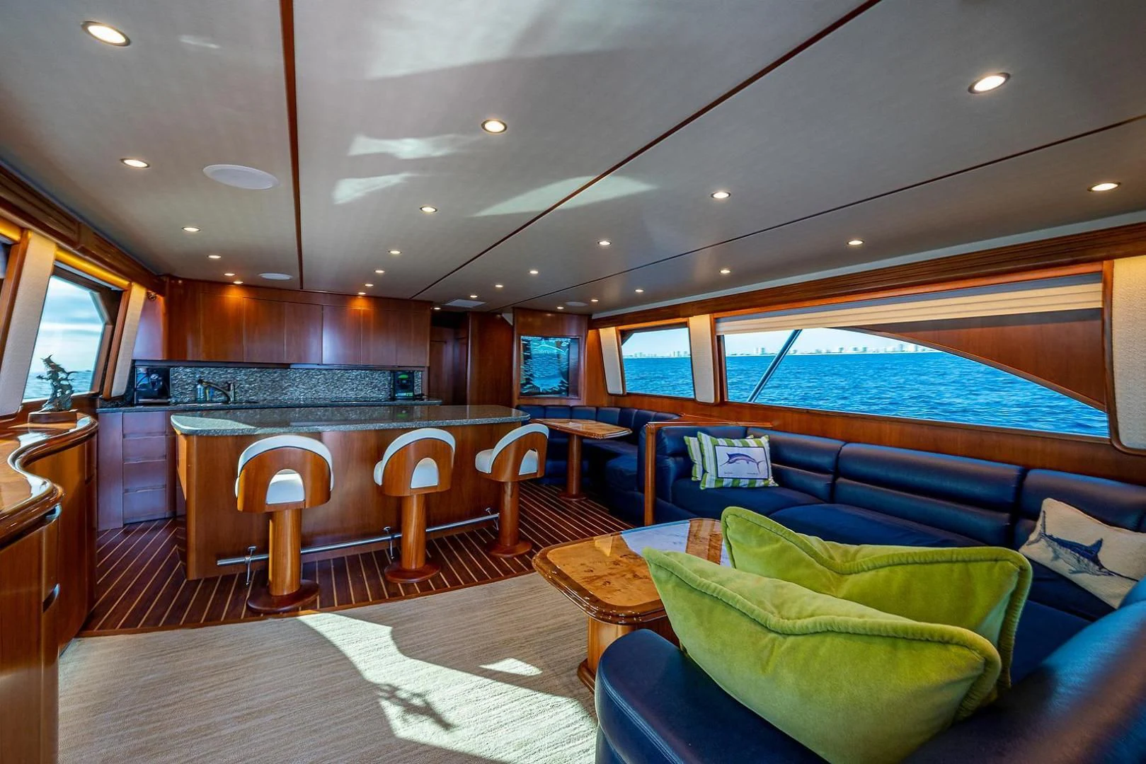 a living room with a large open window aboard LIFE IS GOOD Yacht for Sale
