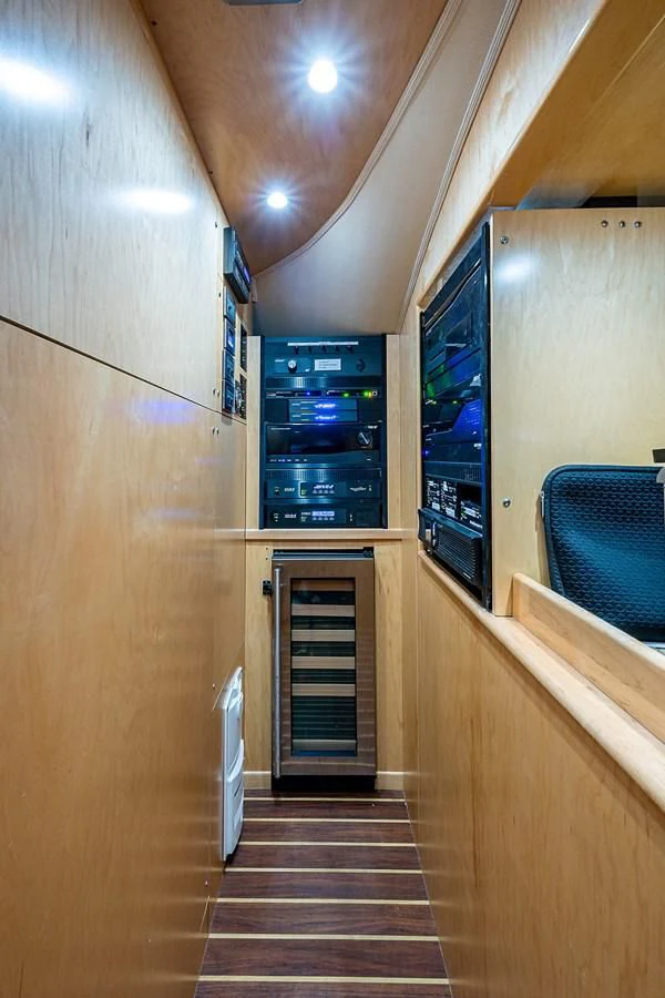 a hallway with a door and a staircase aboard LIFE IS GOOD Yacht for Sale