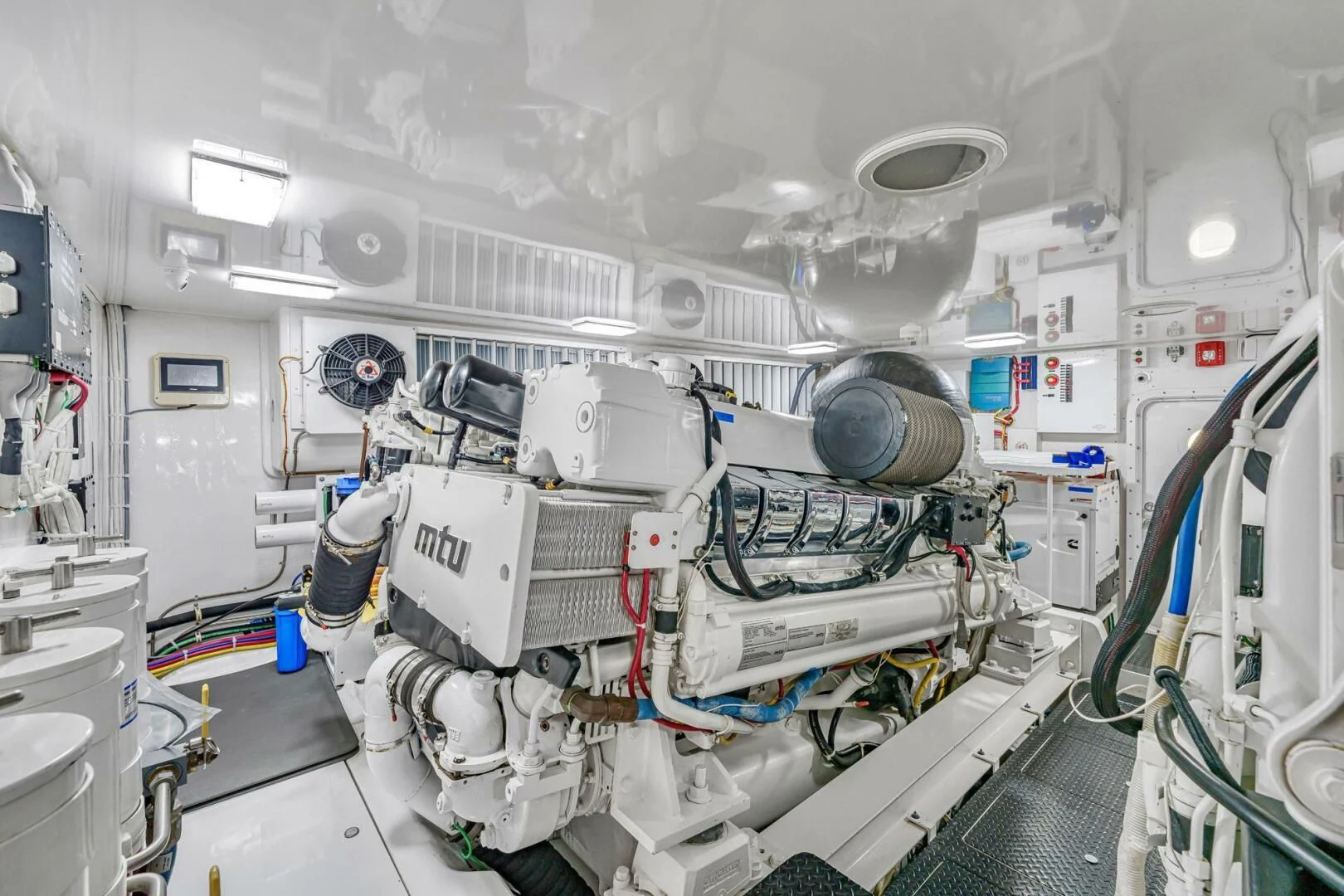 a room with white machines aboard LIFE IS GOOD Yacht for Sale
