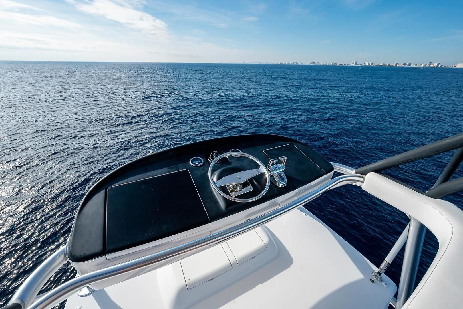 the steering wheel of a boat aboard LIFE IS GOOD Yacht for Sale