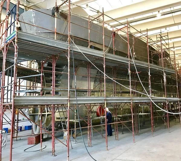 a person working in a warehouse aboard RENATA Yacht for Sale