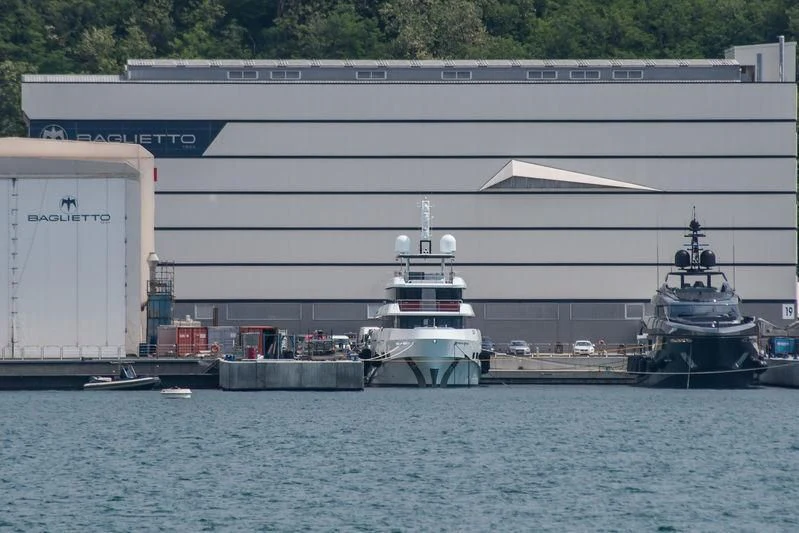 a boat docked at a pier aboard RENATA Yacht for Sale