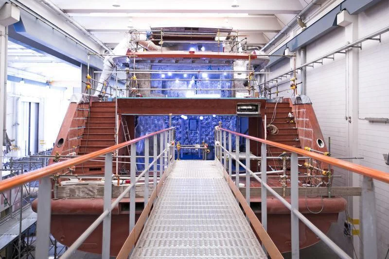 a large room with several escalators aboard RENATA Yacht for Sale