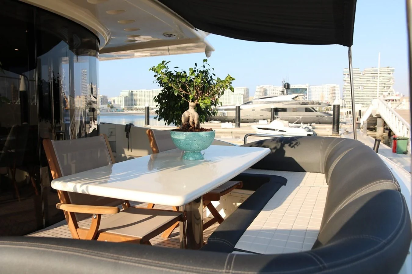 a table with chairs on it aboard SIMONA Yacht for Sale