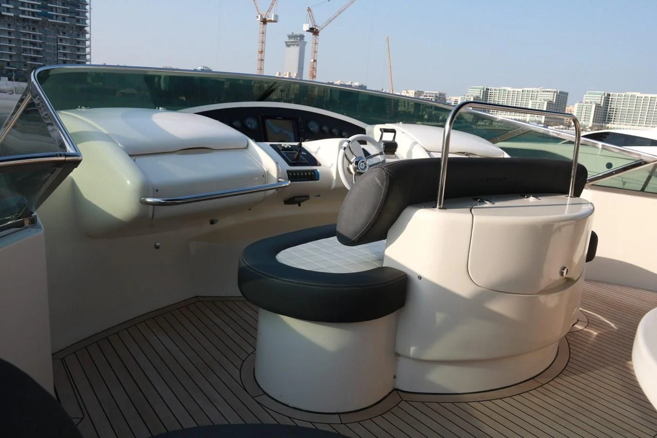 a white tub and a black seat on a car aboard SIMONA Yacht for Sale