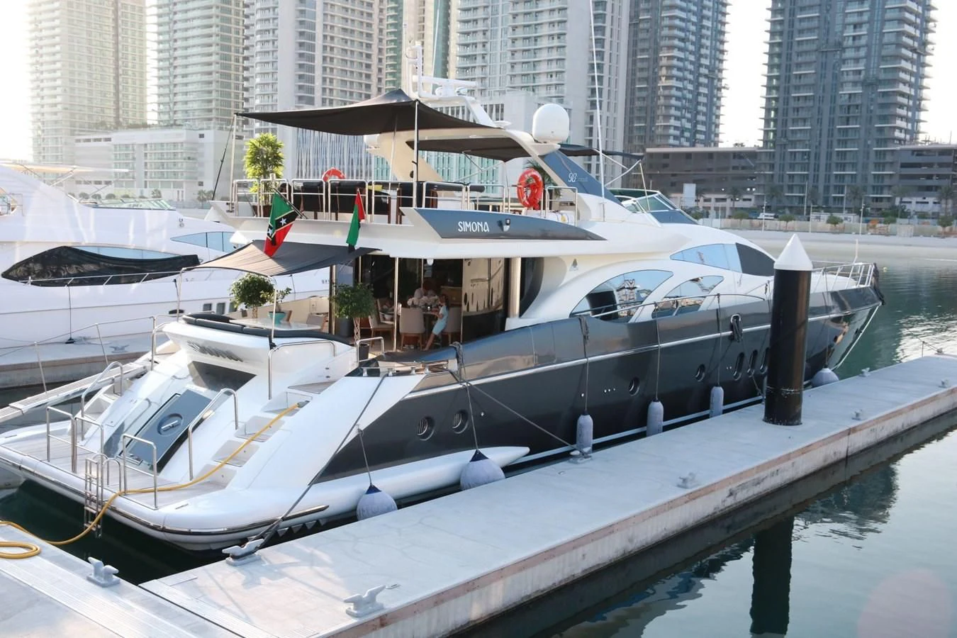a boat docked at a pier aboard SIMONA Yacht for Sale