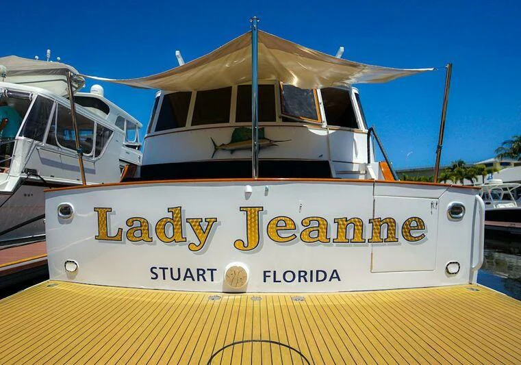 a boat on a dock aboard MOMMA BEAR Yacht for Sale
